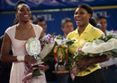 Venus and Serena Williams chuckle