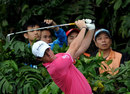 Rory McIlroy stares down an iron approach