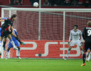 Manuel Friedrich rises high to head past Petr Cech