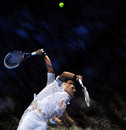 Novak Djokovic powers down a serve