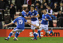 Franco Di Santo celebrates with team-mates after scoring for Wigan