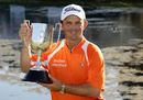 Greg Chalmers hoists the Australian PGA Championship trophy