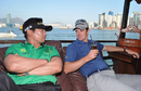 YE Yang and Justin Rose relax on a boat