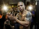 Miguel Cotto greases his palms