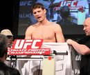 Michael Bisping pleads his case to a commission official after missing weight