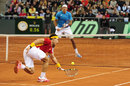 Rafael Nadal stretches to reach a drop shot