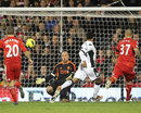 Pepe Reina makes a reaction save to deny Moussa Dembele