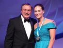 John Newcombe presents Sam Stosur with the Newcombe Medal