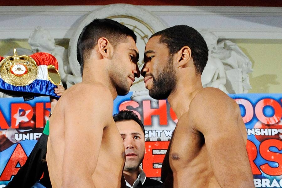 Amir Khan and Lamont Peterson square off after the weigh-in
