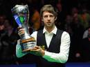Judd Trump shows off his trophy