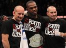 Jon Jones poses for a photo with his trainer Greg Jackson (left)