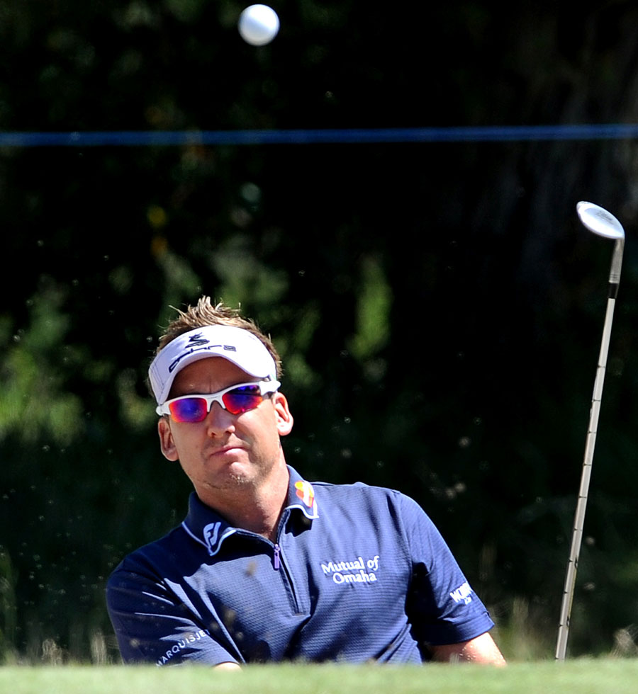 Ian Poulter eyes a chip shot