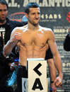 Carl Froch stands on the scales