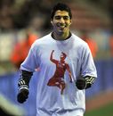 Luis Suarez raises a smile in the pre-match warm-up