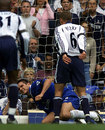 Tottenham's Chris Perry and Frank Lampard clash