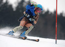 US skier Sarah Schleper carries her son during a practice run on the slalom course