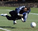 Henrique Hilario makes a save during training