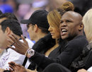 Floyd Mayweather Jnr watches the action
