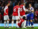 Arsenal players want a word with Joey Barton after his foul on Mikel Arteta