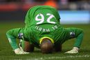 Ali Al-Habsi kisses the ground after Wigan's opening goal
