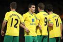 Bradley Johnson faces his keeper as Norwich defend a free-kick