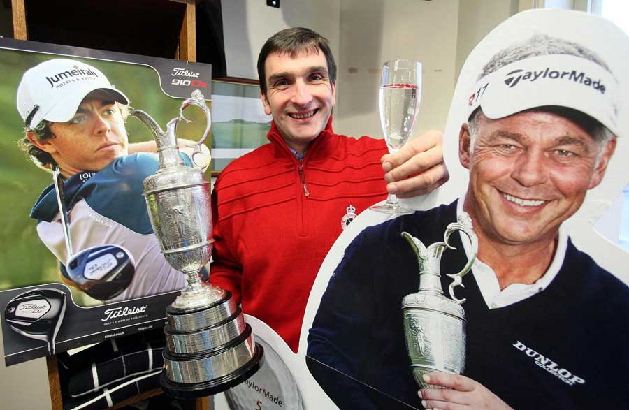 Phillip Tweedie, captain at Royal Portrush, raises a glass to Darren Clarke and Rory McIlroy