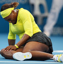 Serena Williams hits the ground in pain