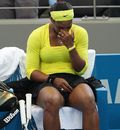 Serena Williams grimaces in pain