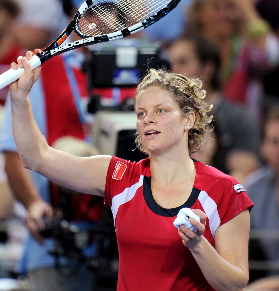 Kim Clijsters celebrates winning her quarter-final match against Iveta Benesova