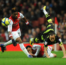 Francis Coquelin and Alex Song battle for the ball with Andros Townsend 