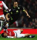 Francis Coquelin falls under Andros Townsend's challenge