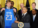 US President Barack Obama receives a jersey from Dirk Nowitzki 