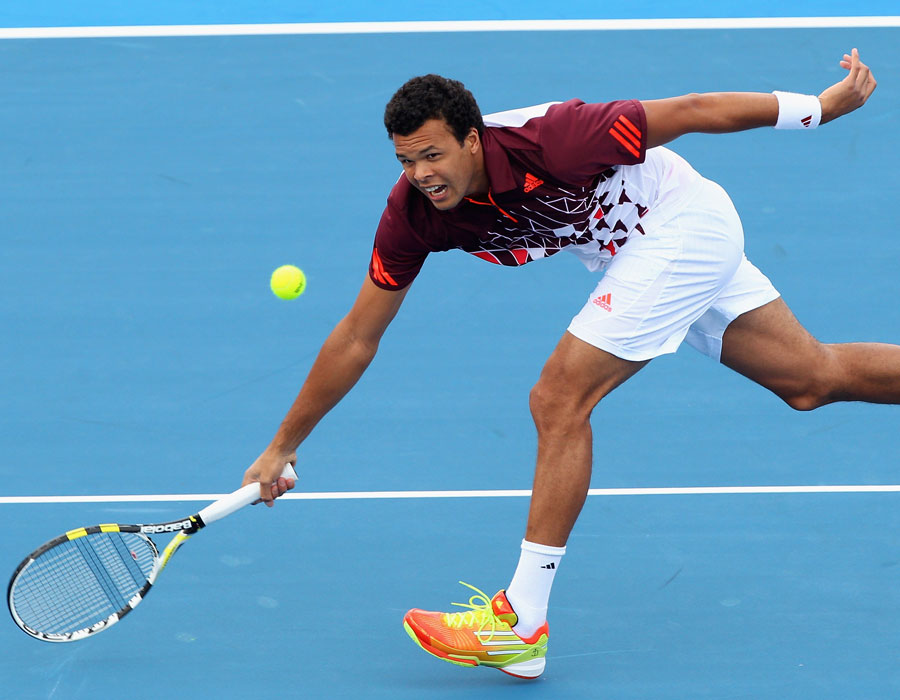 Jo-Wilfried Tsonga stretches for a volley