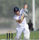 Jonathan Trott plays back down the pitch