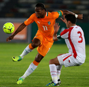 Didier Drogba evades the defender