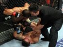 Jose Aldo punches Chad Mendes