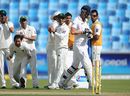 Saeed Ajmal celebrates dismissing Kevin Pietersen