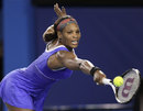 Serena Williams stretches to reach the ball