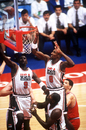 Michael Jordan, Scottie Pippen and Magic Johnson field the rebound