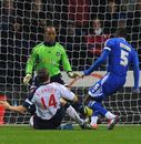 Kevin Davies slides home the opener