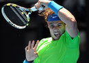 Rafael Nadal crunches a return