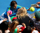 Rafael Nadal signs some autographs