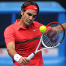 Roger Federer eases into a volley