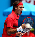 Roger Federer celebrates victory