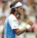 Feliciano Lopez reacts to winning a point against John Isner 