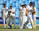 Pakistan celebrate as the lbw referral against Kevin Pietersen is upheld
