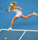 Maria Sharapova tracks down a forehand