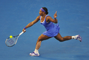 Serena Williams stretches for a return