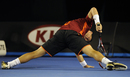 Lleyton Hewitt stretches after a lost point