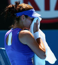 Julia Goerges wipes her face
